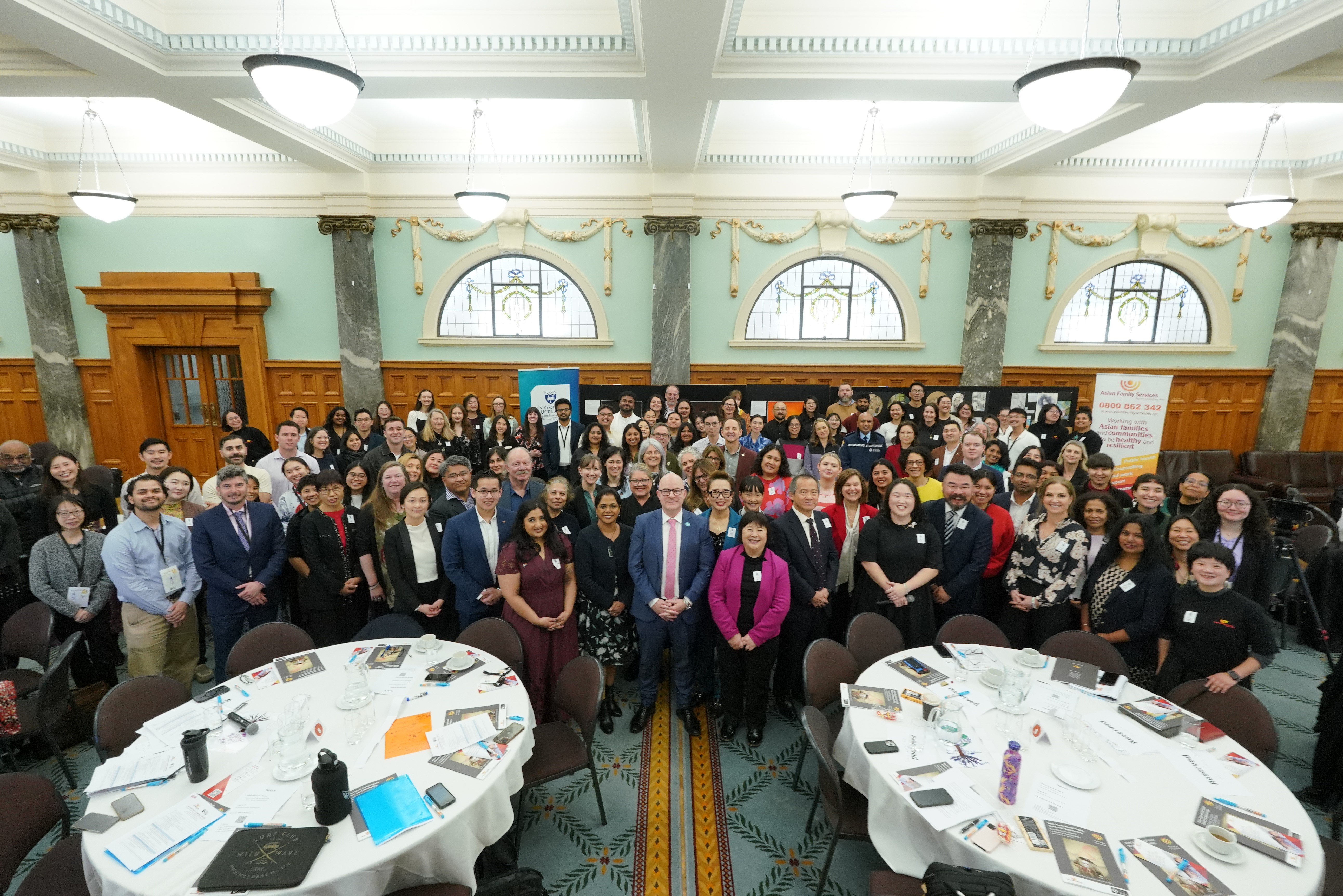 Group photo of 120 participants gathered to discuss and improve mental health outcomes for Asian youth in Aotearoa New Zealand.